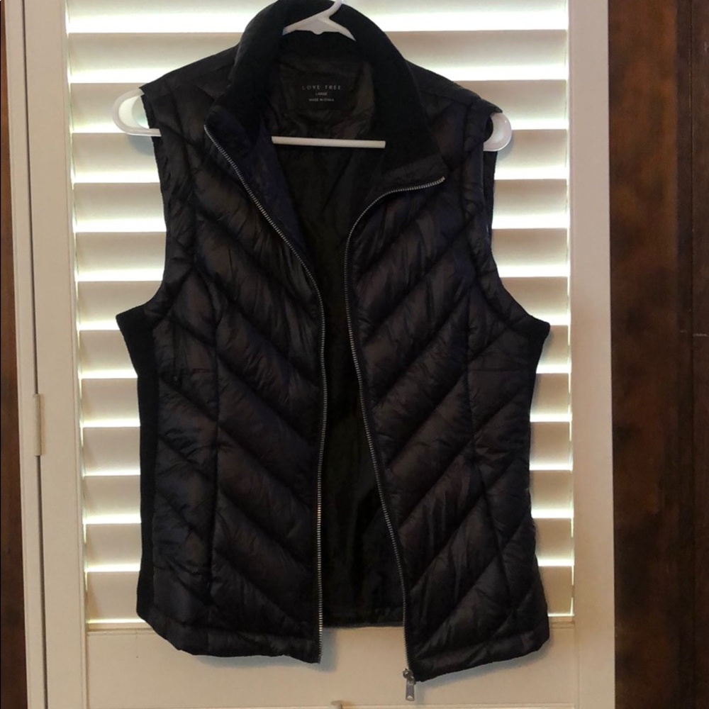 Puffy sleeveless zip up vest
